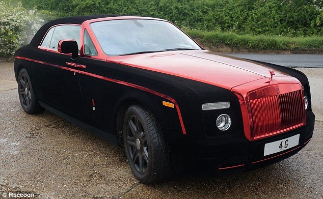 Rolls Royce wrapping include a red gold panel in the centre of the black velvet 